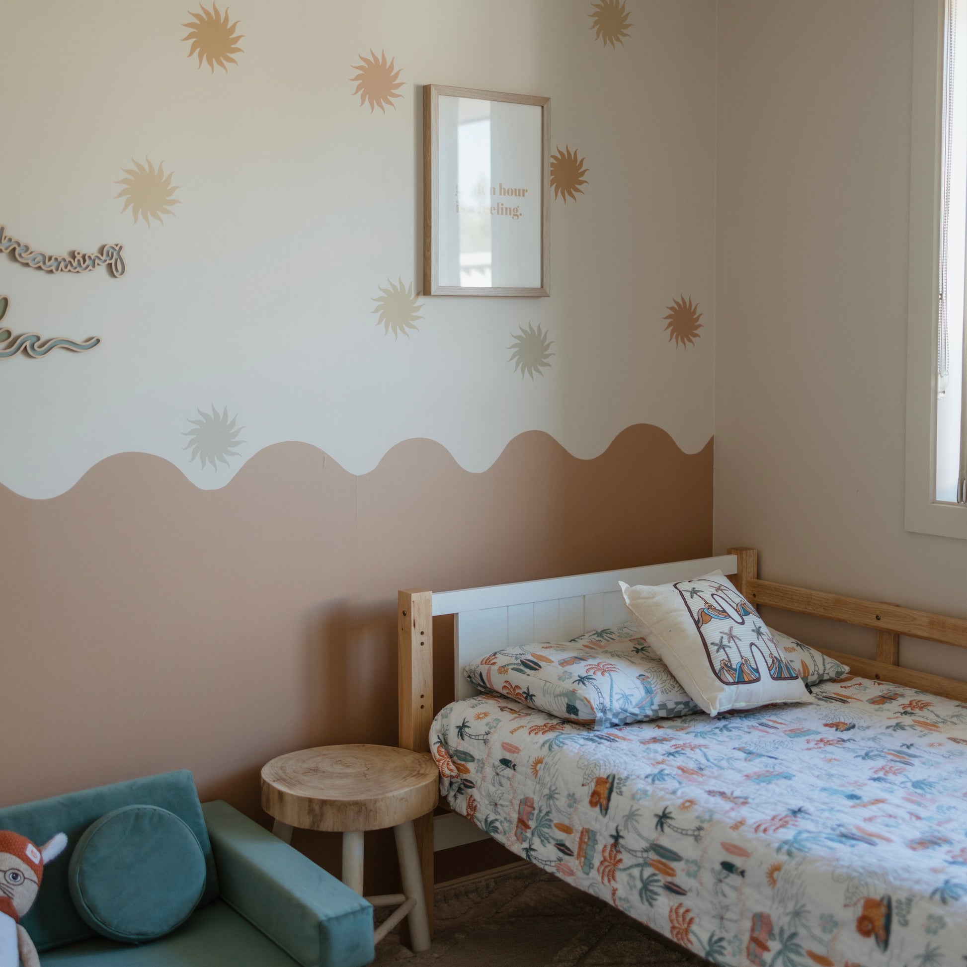 kids bedroom with warm wavy wall removable wallpaper and retro sun decals 