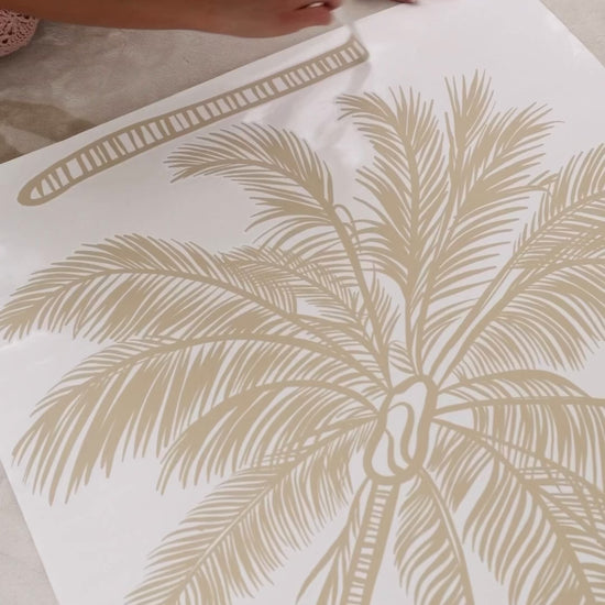 Renter-friendly coastal palm tree wall decal installation

