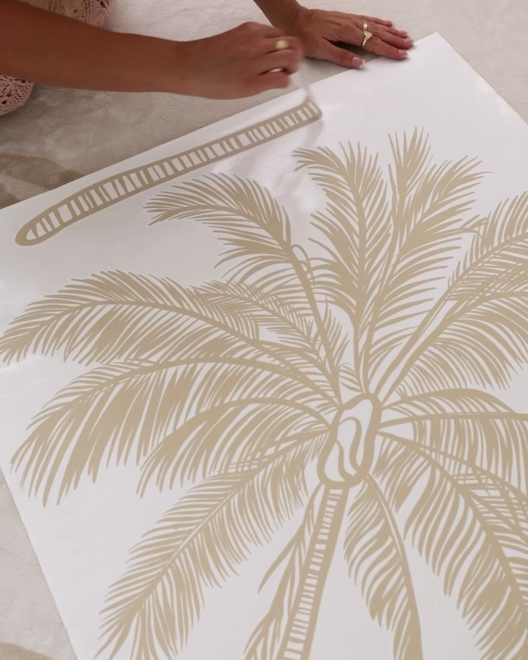 Renter-friendly coastal palm tree wall decal installation
