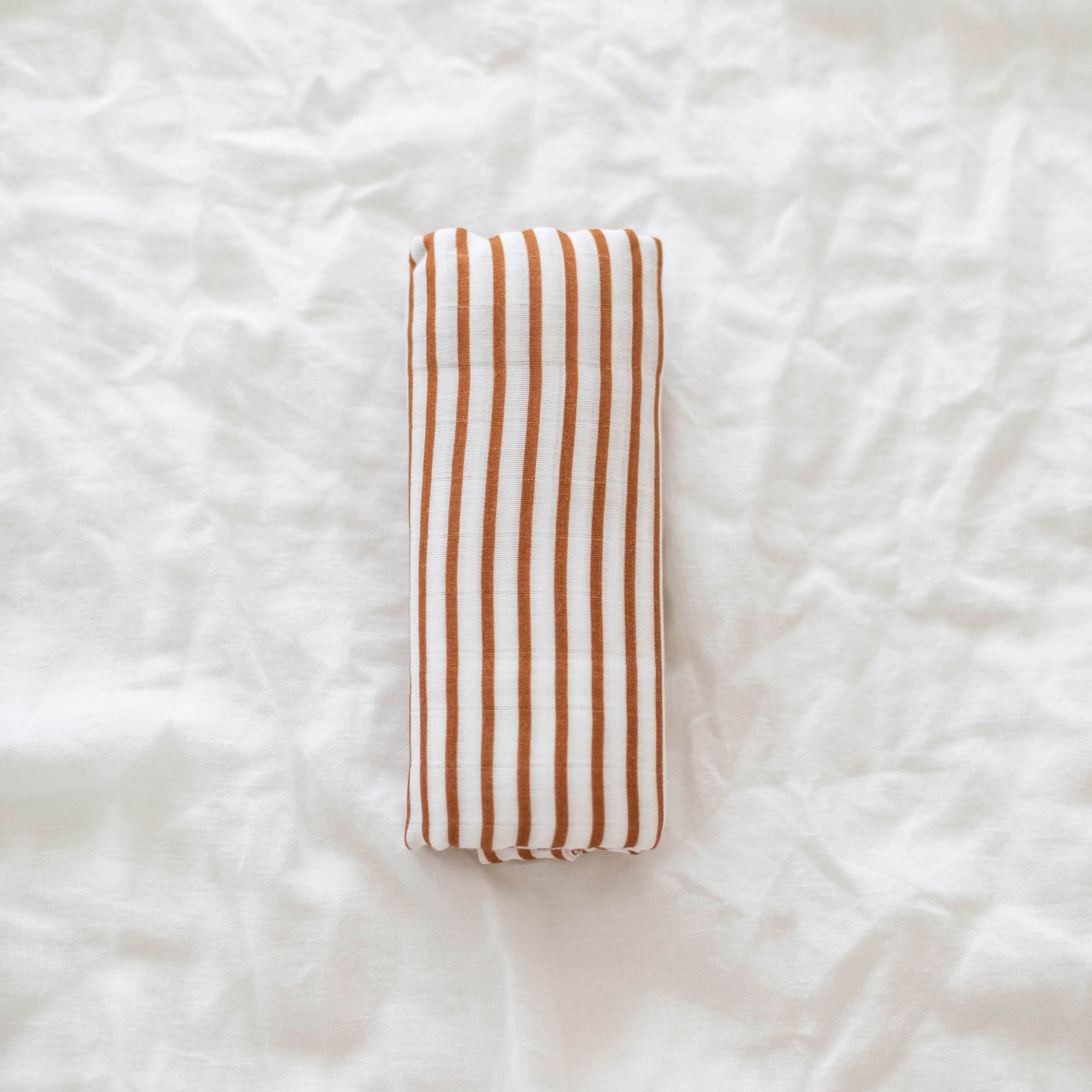 rust-stripe-swaddle-blanket